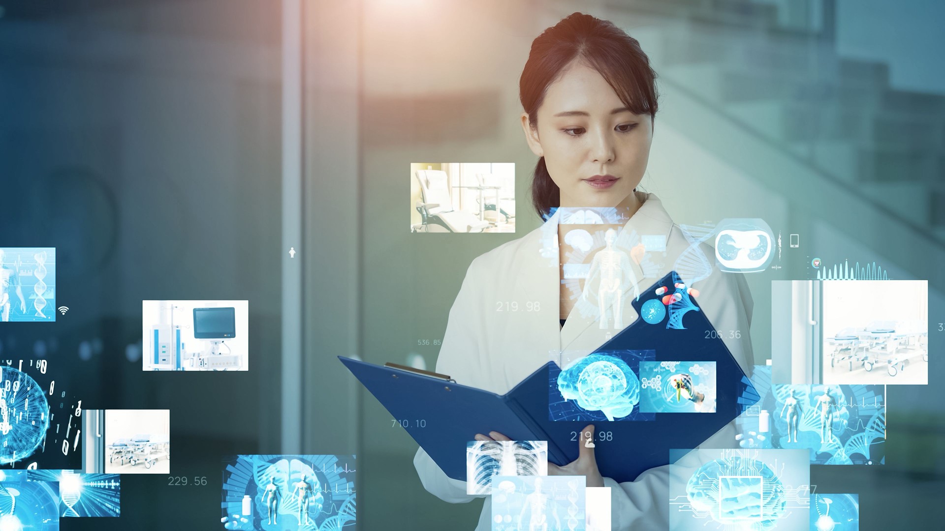 Young asian doctor watching hologram screens. Medical technology. Medtech.